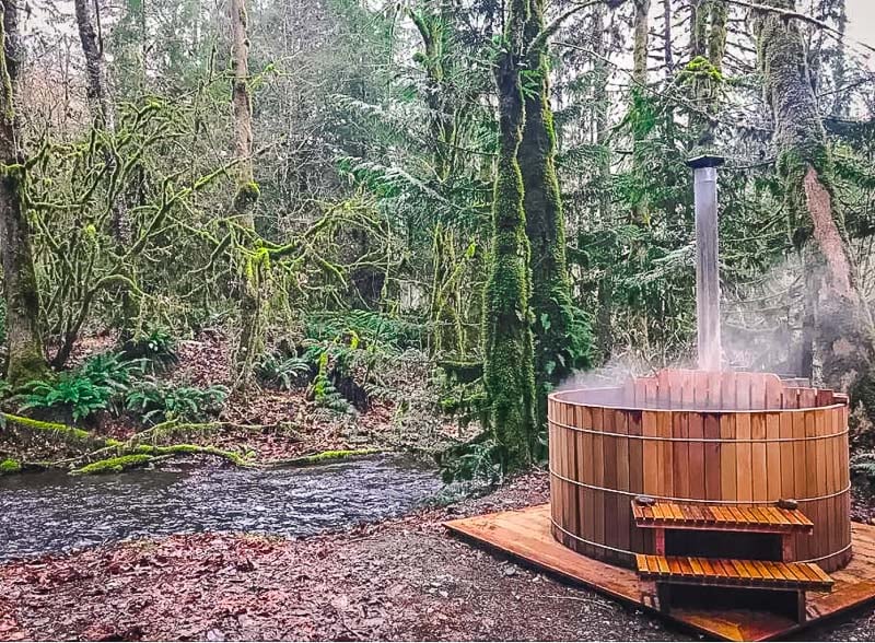 Soak in the wood-fired cedar hot tub beneath the stars.