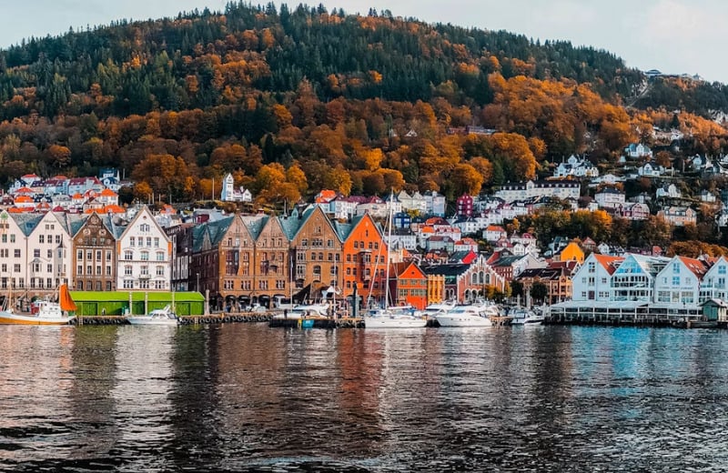 Embark on a journey through Bergen’s majestic fjords and charming cityscape, surrounded by natural wonders.