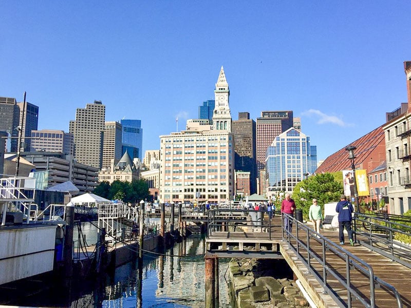 The Boston Harborwalk is a scenic waterfront path with stunning views of the skyline, harbor, and passing boats.