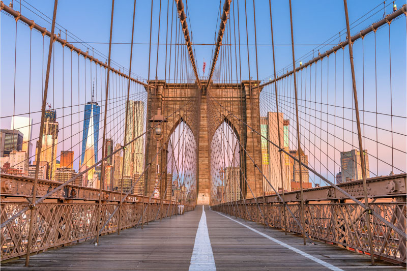 Connecting Manhattan to Brooklyn over the East River, the Brooklyn Bridge is an iconic symbol of architectural prowess and historical significance.