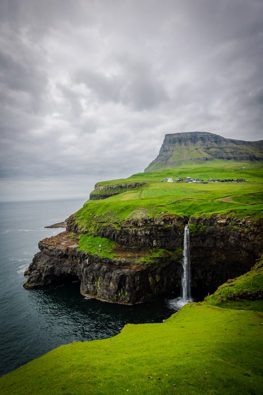Sea cliffs with a waterfall
