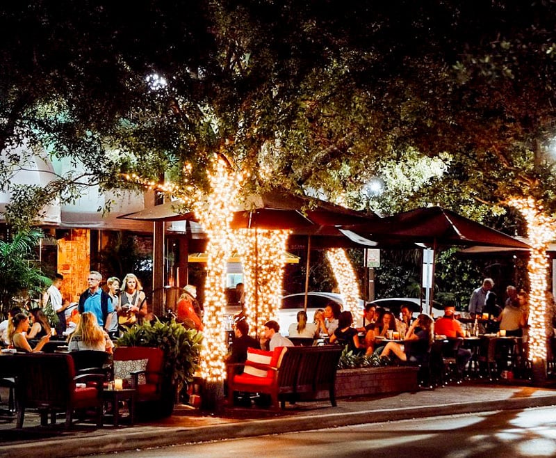 Coconut Grove is the oldest and most charming neighborhood, blending history, culture, and entertainment with a bohemian vibe.
