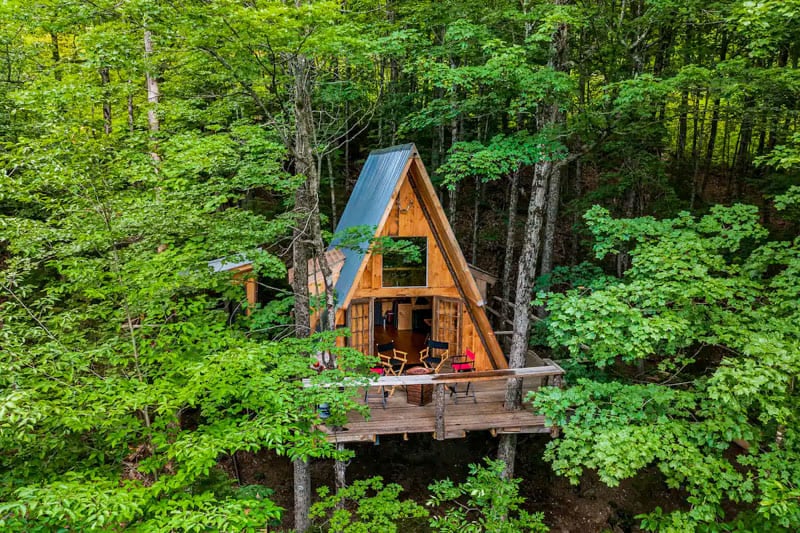 Crooked Maple Treehouse offers a unique stay among the leaves with authentic Vermont craftsmanship.