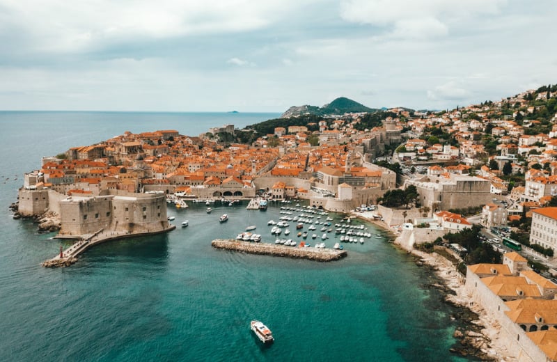 Step into Dubrovnik’s historic charm and coastal beauty, with ancient walls and serene Adriatic waters.