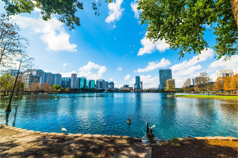 Lake Eola Park: Downtown oasis with swan boats and iconic fountain, a serene escape for locals and tourists.