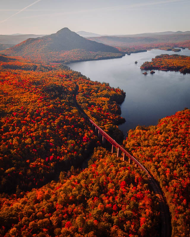 Scenic aerial view of white mountains and lake in autumn