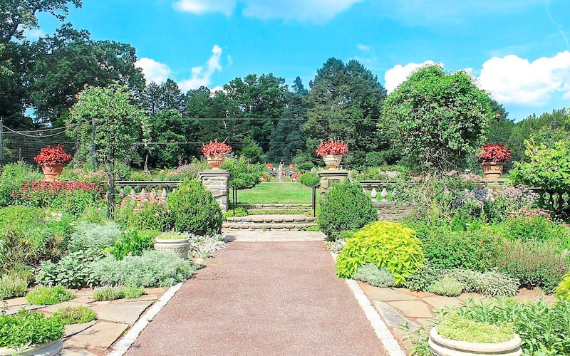 Morris Arboretum & Gardens is a beautiful botanical garden that features a wide variety of plants, trees, and landscapes.