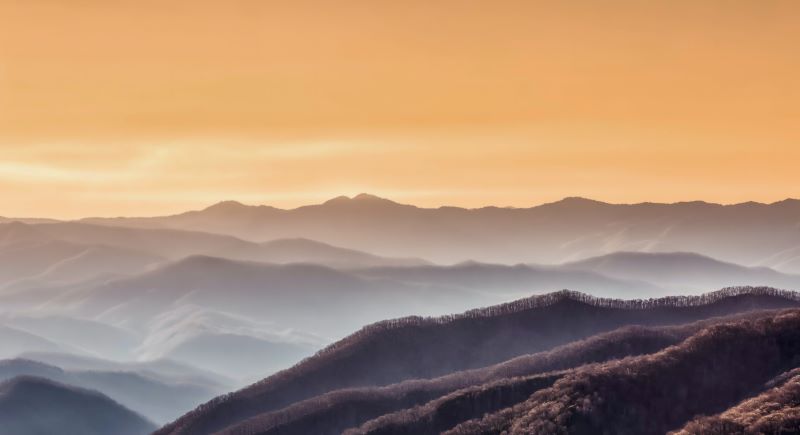 Scenic view of Newfound Gap with mountain peaks against a clear sky