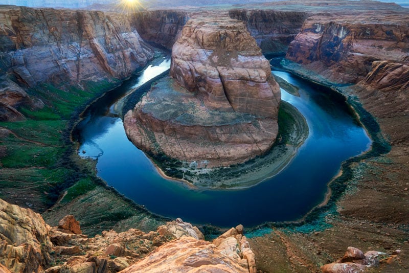 Horseshoe Bend features a dramatic curve in the Colorado River near Page, Arizona.