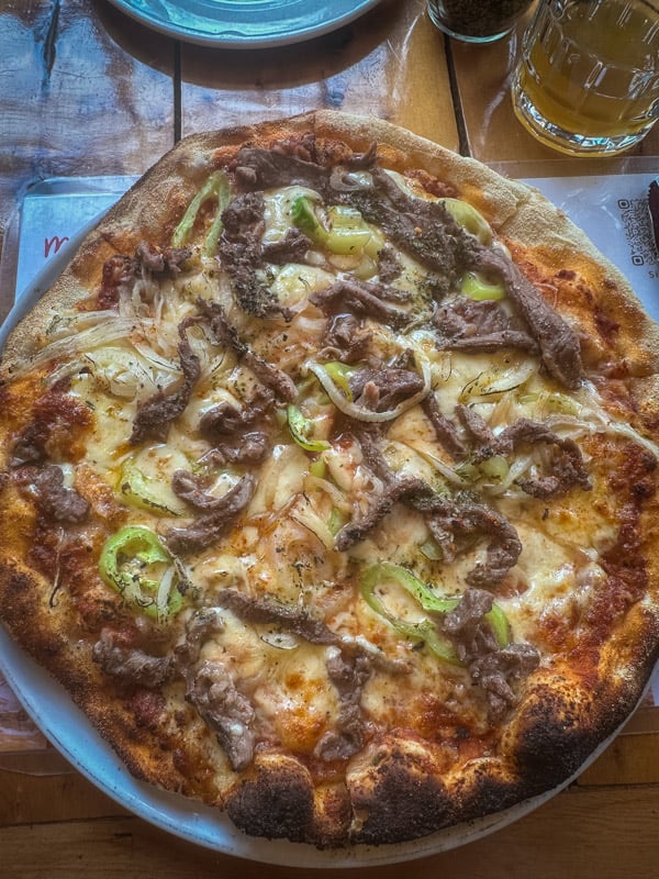 Pizza with lamb and veggies
