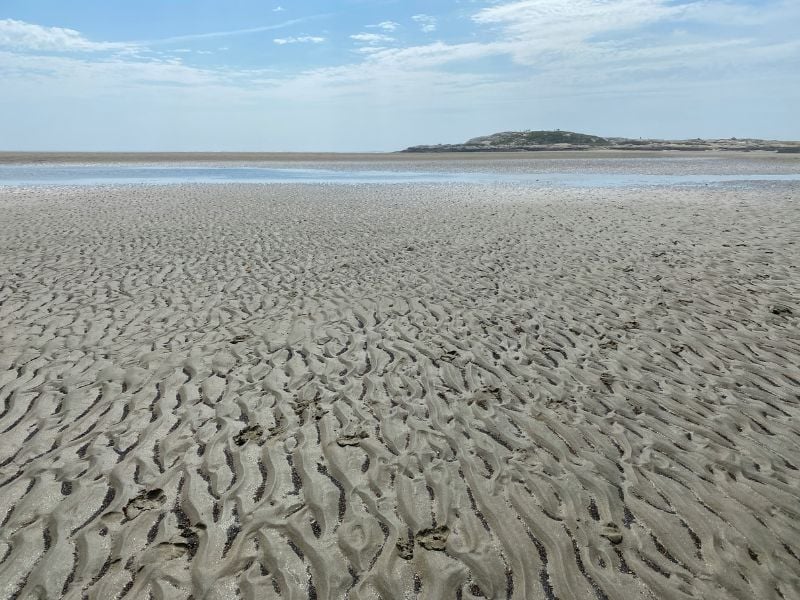 Popham Beach State Park, often overlooked, is a hidden gem in Maine that holds a special appeal for beach enthusiasts.
