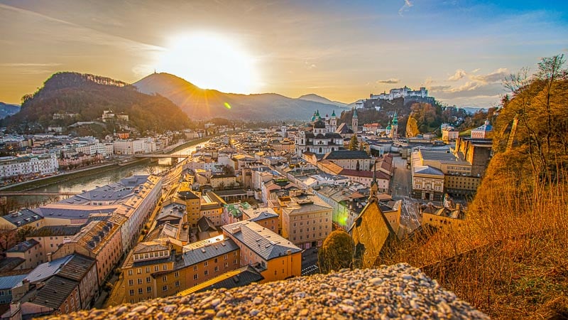 Salzburg is surrounded by mountains.