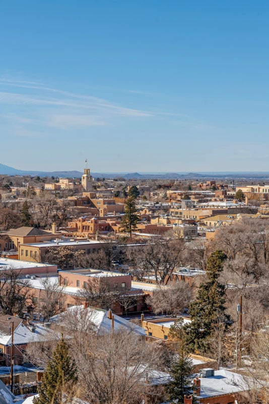 Santa Fe, New Mexico, is known for its rich history, vibrant arts scene, adobe architecture, and natural beauty.