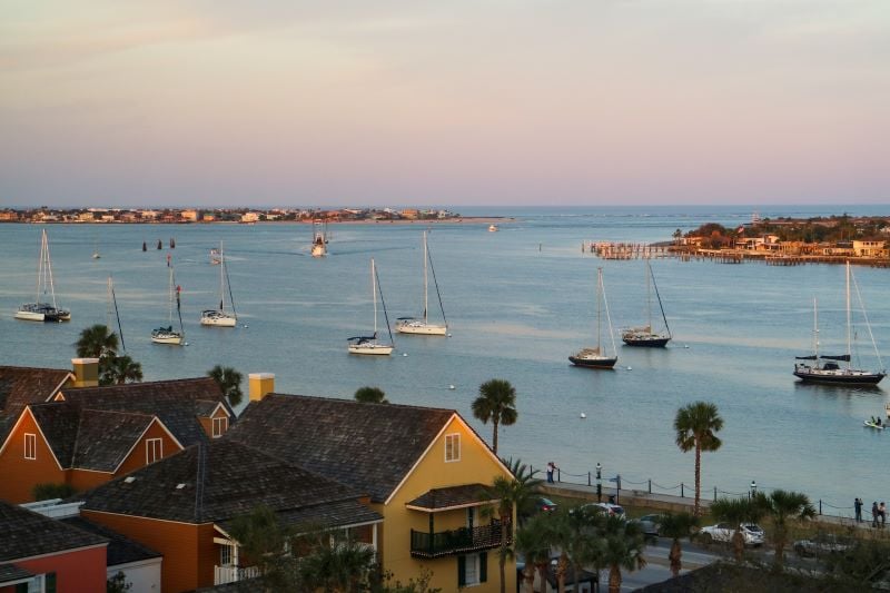 A serene beach scene in St. Augustine, with waves gently lapping the shore
