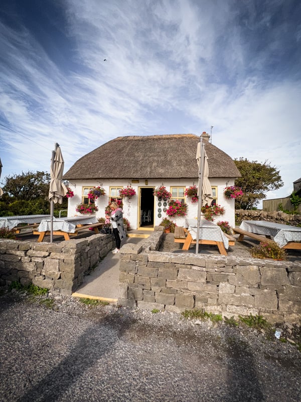 A traditional thatched cottage near Dún Aonghasa