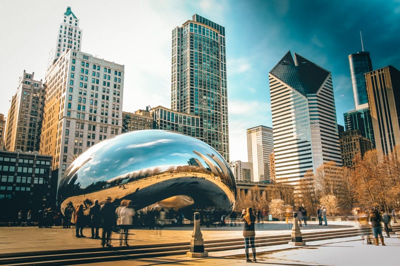 Cloud Gate in Chicago, a renowned tourist spot, showcases a reflective sculpture resembling a giant bean