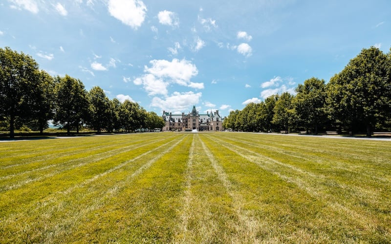 The Biltmore Estate—a grand and opulent mansion nestled in the heart of the Blue Ridge Mountains in Asheville, North Carolina. 