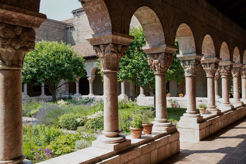 Travelers seeking a unique cultural experience shouldn't miss The Cloisters. Perched atop Fort Tryon Park, it's a serene Manhattan escape with free admission.
