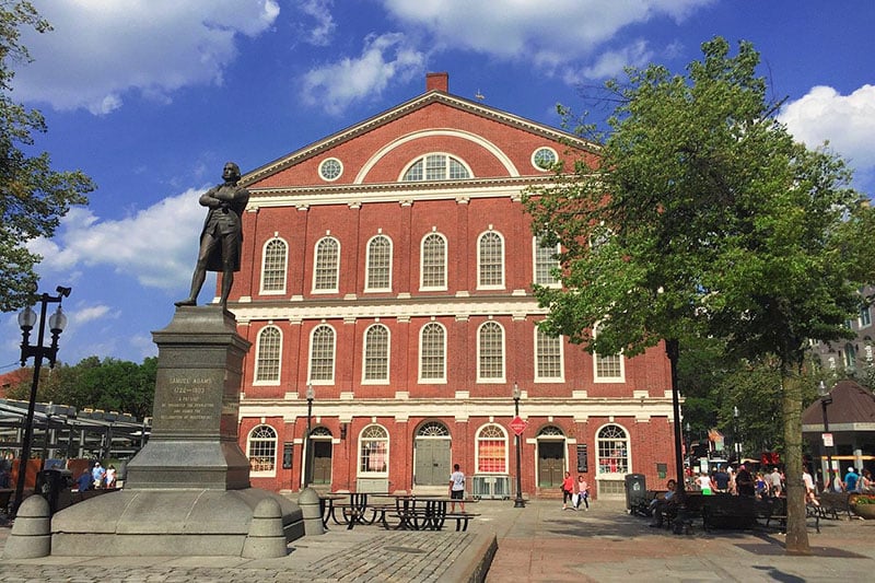 Iconic red-brick path winding through Boston's historic landmarks of independence