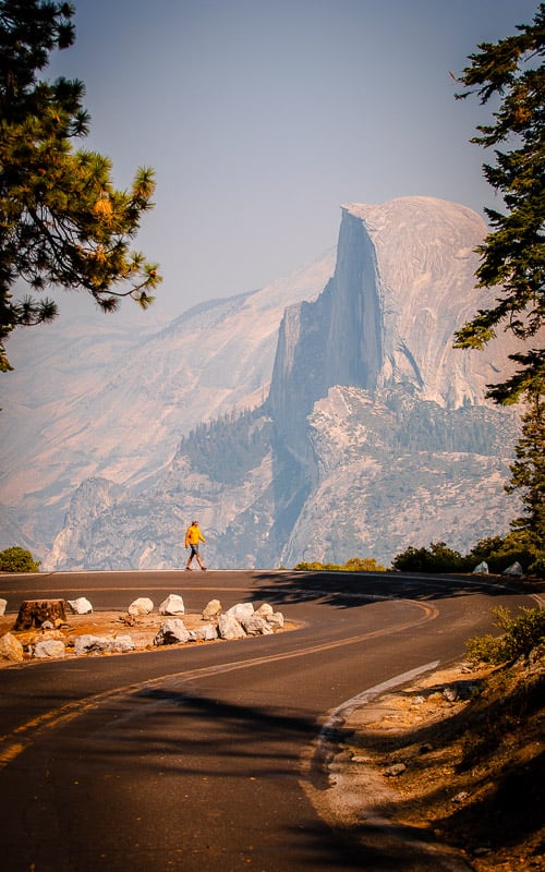Runner on road with mountain backdrop