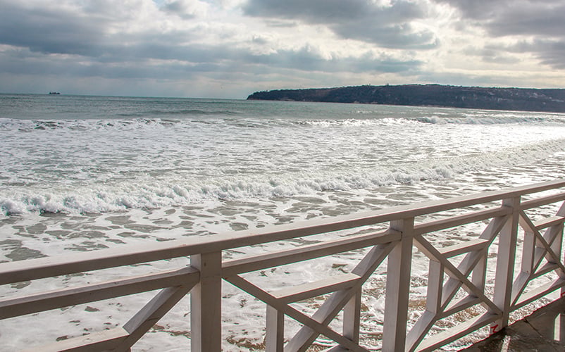 Scenic ocean vista from balcony overlooking tranquil blue sea in Varna, Bulgaria