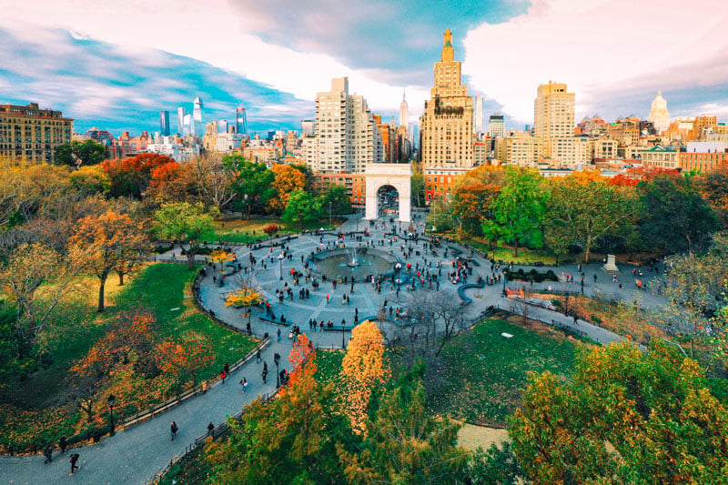 Greenwich Village's Washington Square Park: Iconic arch, fountains, greenery—a top Manhattan spot to relax and soak in eclectic energy.