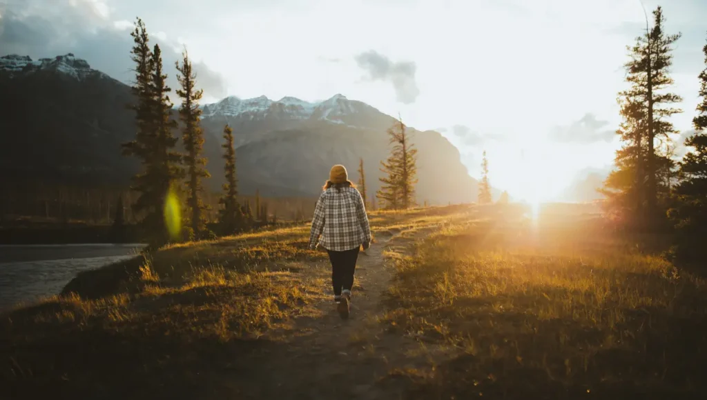 A person walking on a hike trail